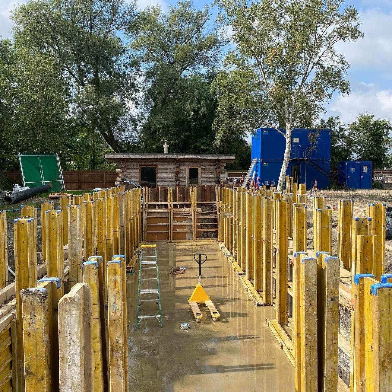 Timber-formed footing lines ready for reinforcement