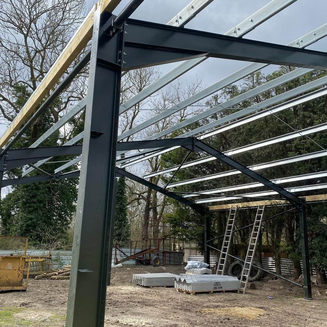 Steel portal frame erected ahead of the slab pour