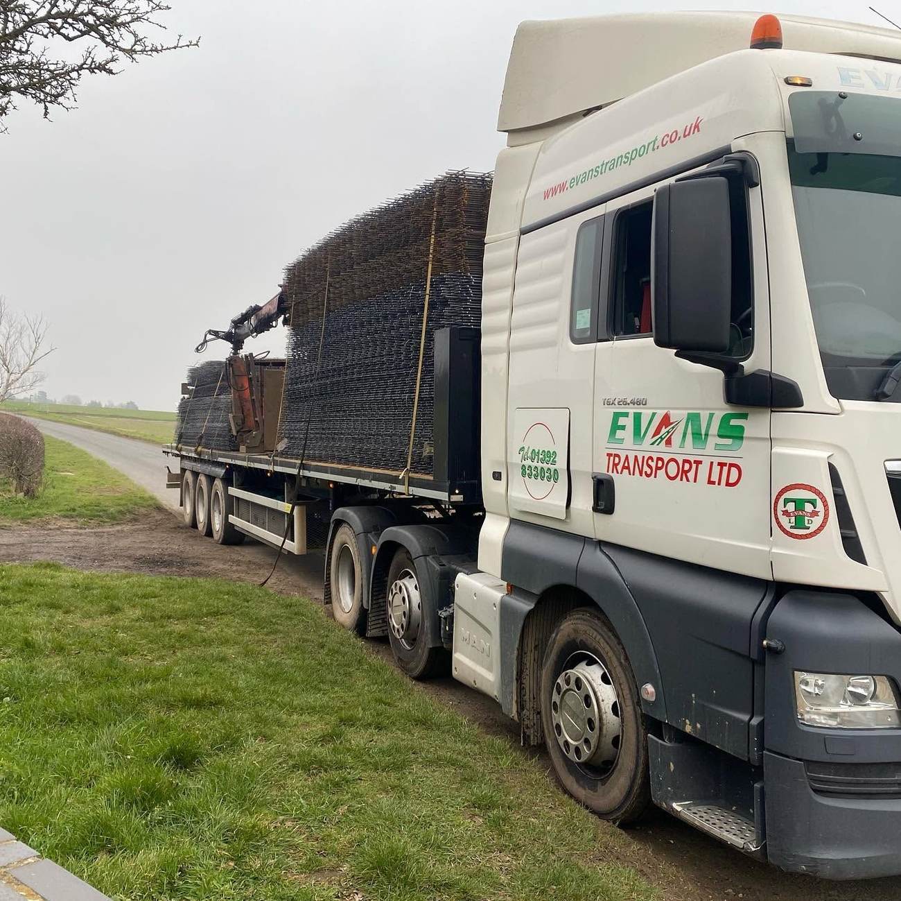 Plant transport lorry on a rural road